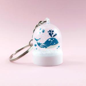 Porte-clés boule à neige pour l'office de tourisme Terres de Nacre